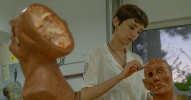 woman working with model of brain